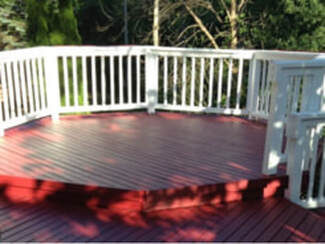Deck Painting Solid Red Color on Hexagon shape, with white railings